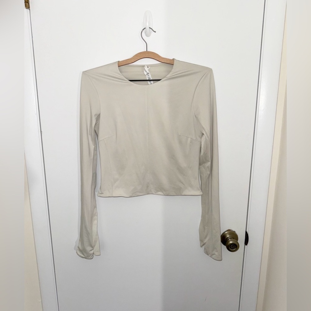Lululemon Tight Fit Lined Cropped Longsleeve - Color Bone - Size M